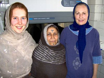 Eckhoff with her mother, Dr. Christina Eckhoff, and an Afghan friend in the lab in Kabul.